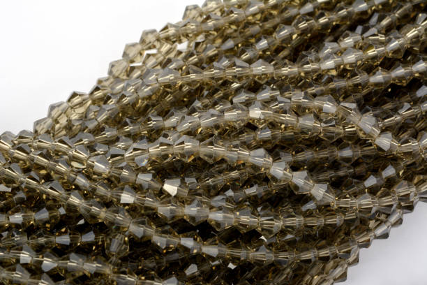 istock Beautiful Glass Sparkle Crystal Isoalted Beads on white background 1304005314