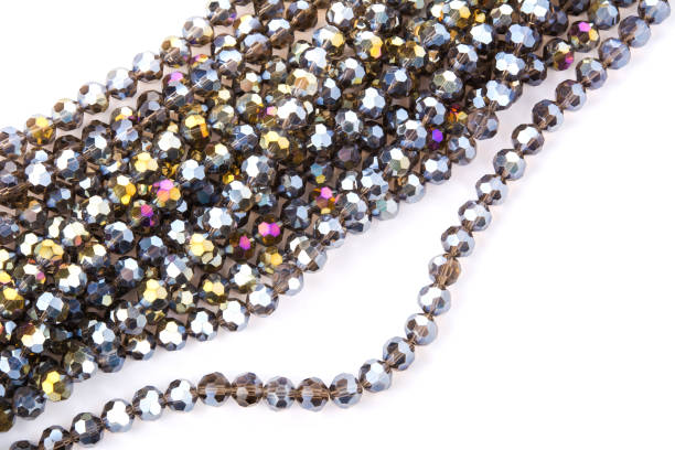istock Beautiful Glass Sparkle Crystal Isoalted Beads on white background 1304005704