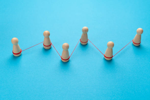 istock Human figures are embedded in a chain with a link. Social communications 1304008776