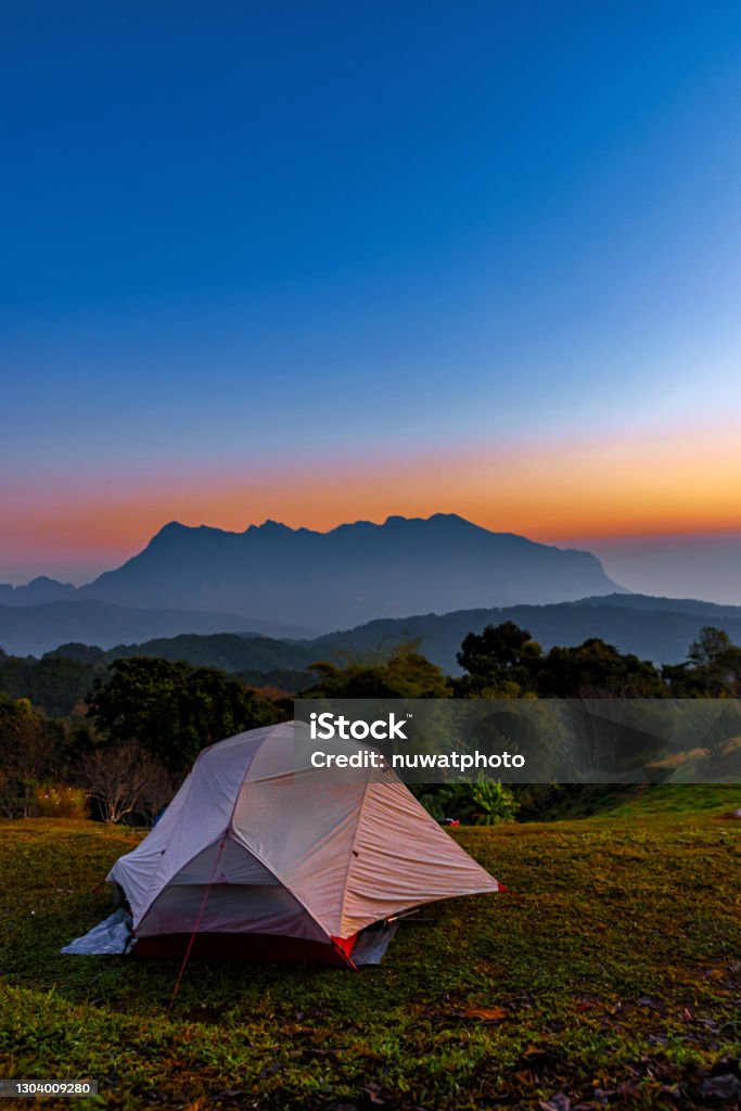 Tourist tent on the hill at San Pa Kia, Doi Mae Ta Man viewpoint located in Chiang mai province, Thailand. Tourist tent on the hill at San Pa Kia, Doi Mae Ta Man viewpoint located in Chiang Dao district, Chiang mai province, Thailand. Backgrounds Stock Photo