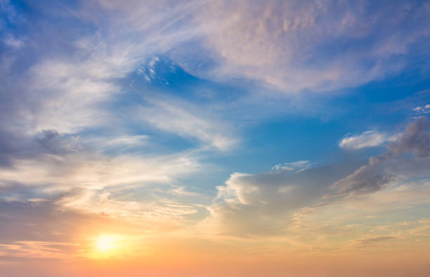 istock Real sundown sunset  sky with beautiful light clouds and sun, wothout any birds. Huge resolutions 1304015508