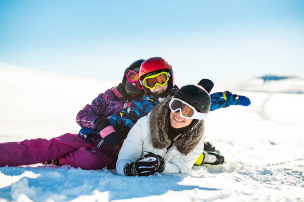 istock Skiing family having fun on winter day 1304015545
