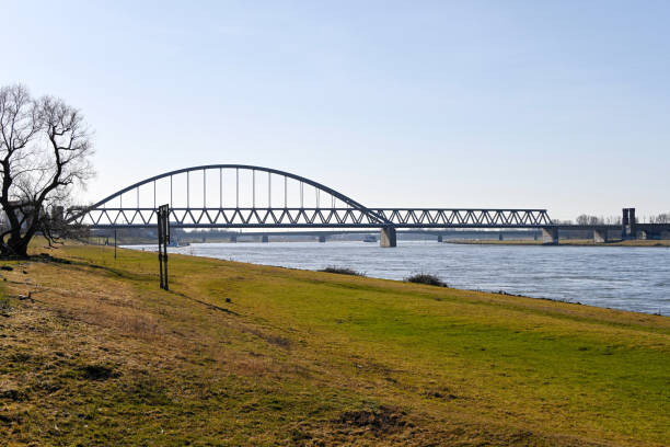 Duesseldorf, Germany, February 21, 2021 - The Hammer railway bridge is an 814-metre-long steel arch bridge between Düsseldorf and Neuss that is reserved for railway traffic. Similarly used predecessor structures at the same location existed since 1870.