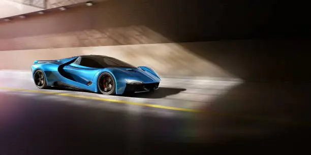 A generic blue sports car on a road travelling at speed, about to move into a tunnel or underpass. The car is highlighted by shots of sunshine at the tunnel mouth. With motion blur to the background and car wheels, and slight lens flare.