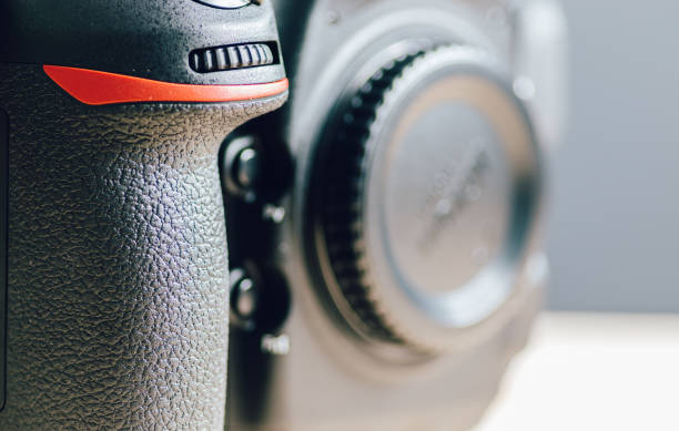 Professional build quality modern DSLR and front buttons close up, built with rugged magnesium alloy and carbon fiber materials, a sturdy camera with flagship technology,