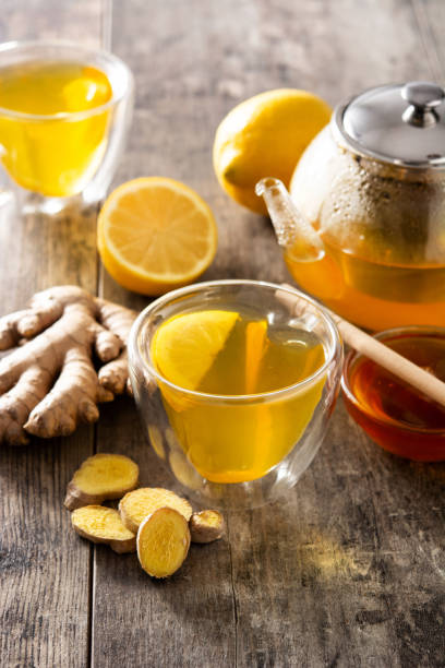 istock Ginger tea with lemon and honey in crystal glass 1304022978