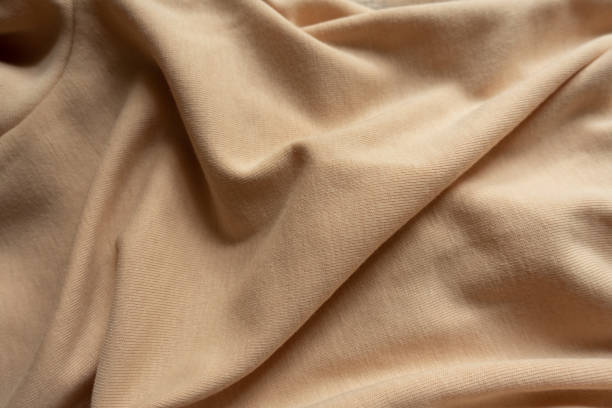 istock Jammed simple beige cotton jersey fabric from above 1304023182