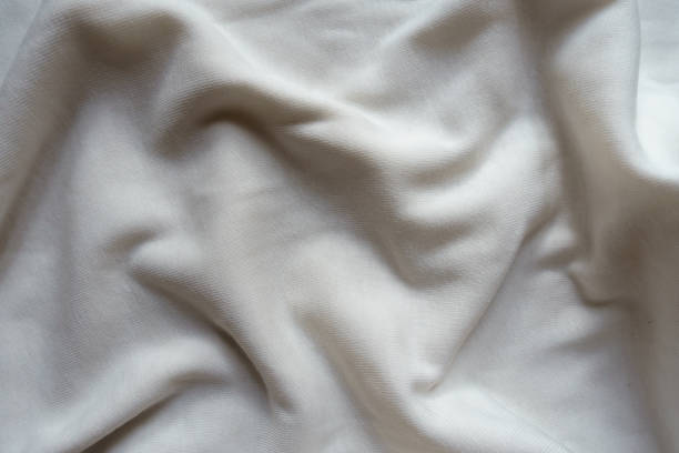 istock White cotton jersey fabric in soft folds 1304023316