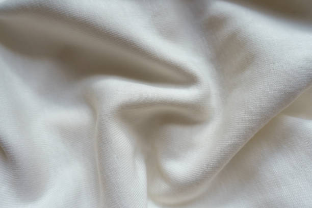 istock Rumpled simple white cotton jersey fabric from above 1304023378