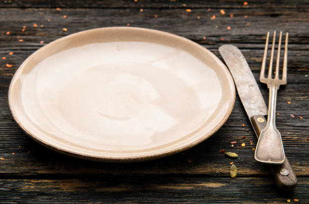 istock Top view of a place setting on dark table. 1304024889