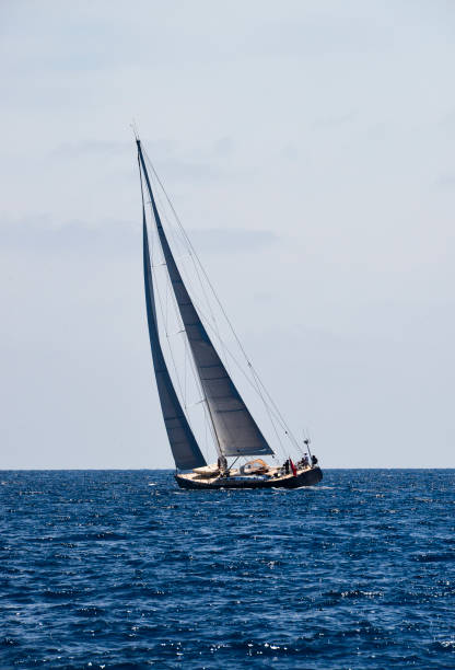 istock Sailboat sailing in blue sea 1304025757