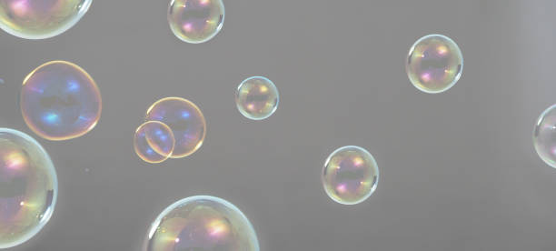 istock Shampoo bubbles floating like flying in the air by wind blow which represent refreshing playful joyful moments and gentle soft comfortable and look wet soapy for hygiene detergent product industry. 1304026376