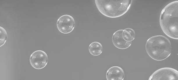 istock Shampoo bubbles floating like flying in the air by wind blow which represent refreshing playful joyful moments and gentle soft comfortable and look wet soapy for hygiene detergent product industry. 1304026378