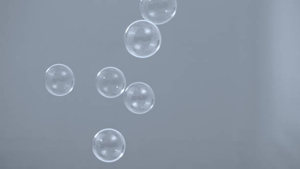 istock Shampoo bubbles floating like flying in the air by wind blow which represent refreshing playful joyful moments and gentle soft comfortable and look wet soapy for hygiene detergent product industry. 1304026379