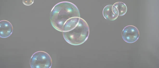 istock Shampoo bubbles floating like flying in the air by wind blow which represent refreshing playful joyful moments and gentle soft comfortable and look wet soapy for hygiene detergent product industry. 1304026432