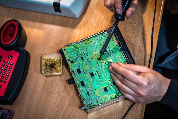 istock master soldering iron solder the microcircuit 1304031546