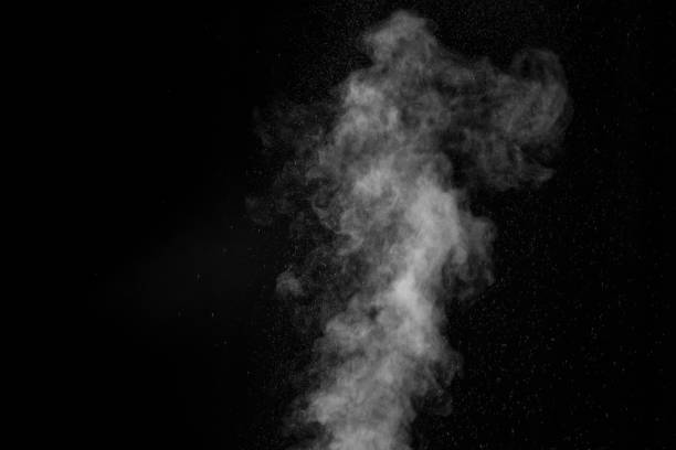 istock White smoke on black background. Figured smoke on a dark background. Abstract background, design element 1304032890
