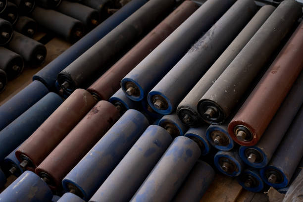 istock rollers for the conveyor movement. conveyor belt details 1304032927