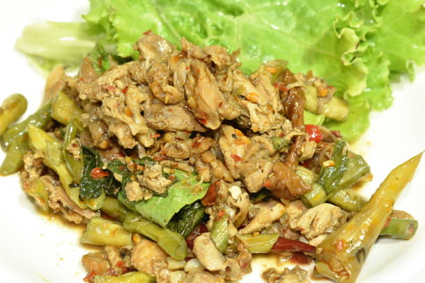istock spicy fried chop duck meat with yard long bean and basil leaf 1304037004