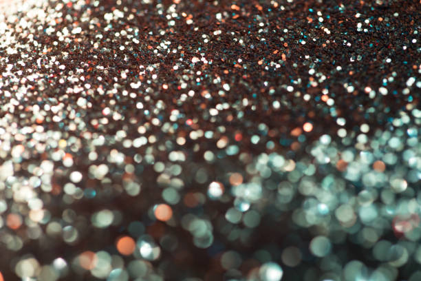 istock festive multicolor and blue glitters background with bokeh and light leak effect 1304037227