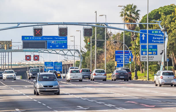 Barcelona Barcelona, Spain - December 29, 2019: Traffic on Avinguda Diagonal through the middle of Barcelona in winter. avenida diagonal stock pictures, royalty-free photos & images