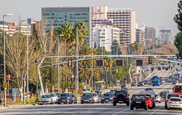 Barcelona Barcelona, Spain - December 29, 2019: Traffic on Avinguda Diagonal through the middle of Barcelona in winter. avenida diagonal stock pictures, royalty-free photos & images