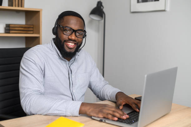 istock African-American office worker on a video call 1304043516
