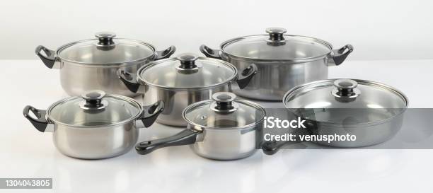 Set Of Stainless Pots With Lids Isolated On White Stock Photo - Download Image Now - Cooking Pan, Durability, Stainless Steel