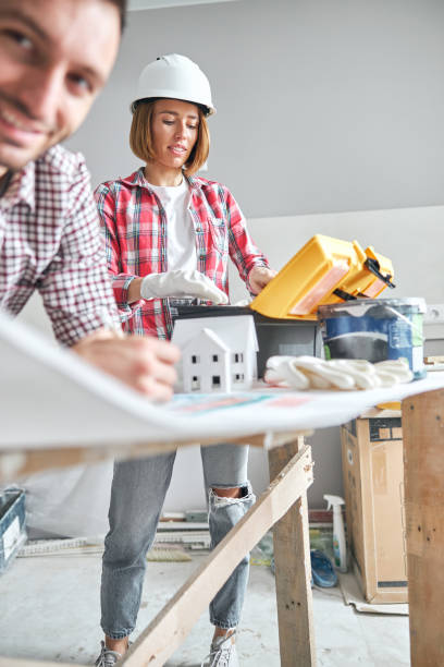 istock Workwoman and a male engineer working together 1304043950