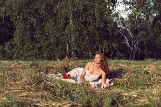 istock Walking with a young woman in the park 1304044106
