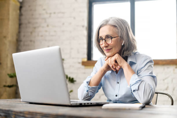 istock Senior woman using the laptop 1304045483