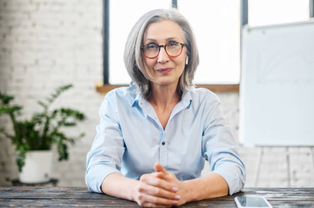 istock Serious mature businesswoman looking at camera 1304046529