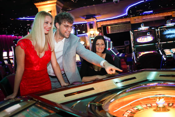 istock People having fun in casino 1304046650