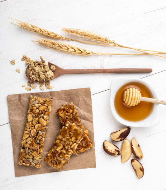 istock Homemade cereal bars with nuts, wheat, muesli and honey 1304048071