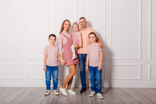 istock beautiful young family of five 1304048088