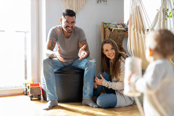 istock Young family having fun together at home 1304048206