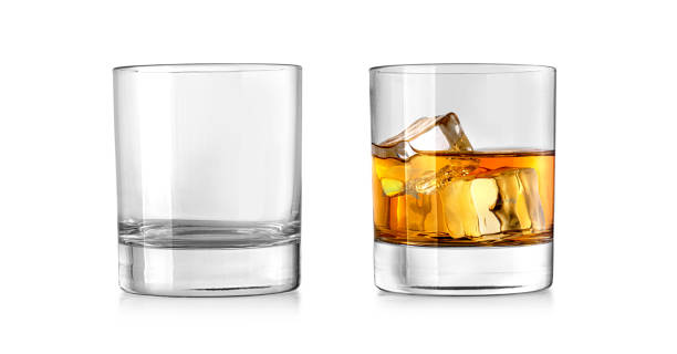 istock Empty and clean whiskey glass isolated 1304048454