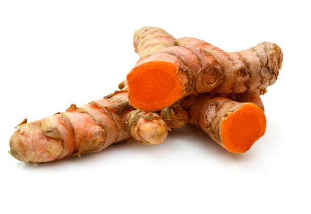 istock turmeric curcuma cut part on white background 1304049531