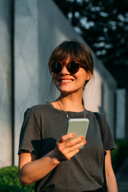 istock Women in Business: a Smiling Young Businesswoman on her Way to Work 1304049579
