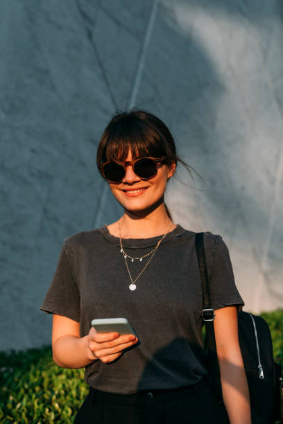 istock Women in Business: a Smiling Young Businesswoman on her Way to Work 1304049585