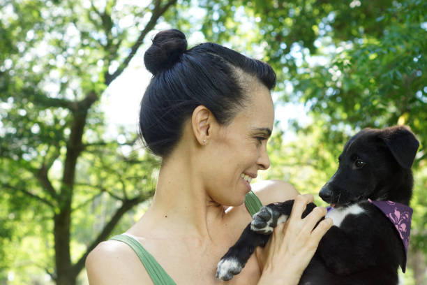 istock woman with her dog 1304052320