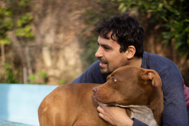 istock Latin man with his pet 1304053302