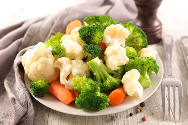 istock broccoli, cauliflower and carrot- vegetarian dish 1304053362