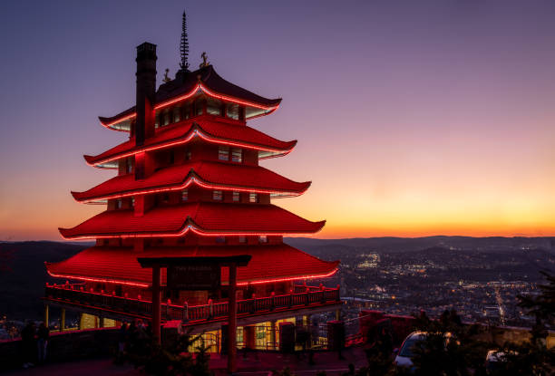 Reading Pagoda At Night Reading, Pennsylvania - November 28, 2020: The red lights of the Reading Pagoda at night overlooking the city of Reading. pagoda stock pictures, royalty-free photos & images