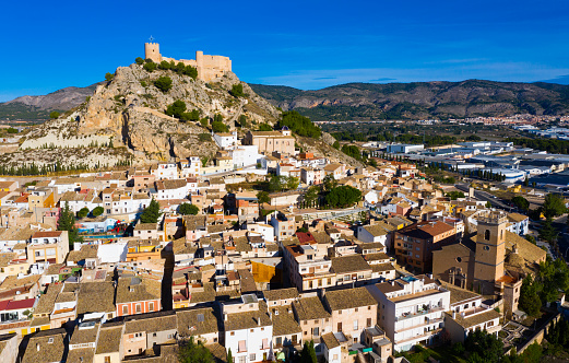 Aerial view of Castalla cityscape with ancient fortified castle, Alicante, Spain