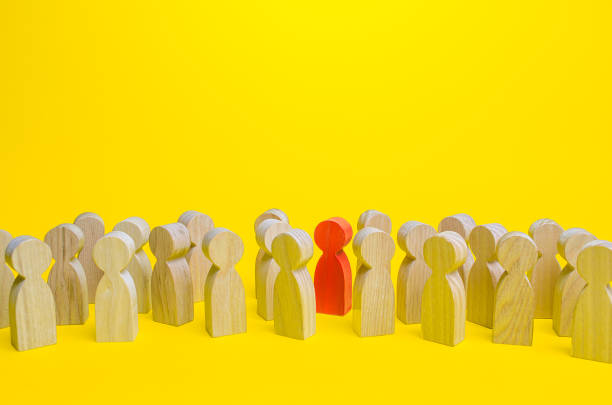 Red man in a crowd. Stranger, eye-catching. Different, special. Infected carrying threat of pandemic spread. Collective immunity. Social distance. Intruder detection. Coming out. Be different