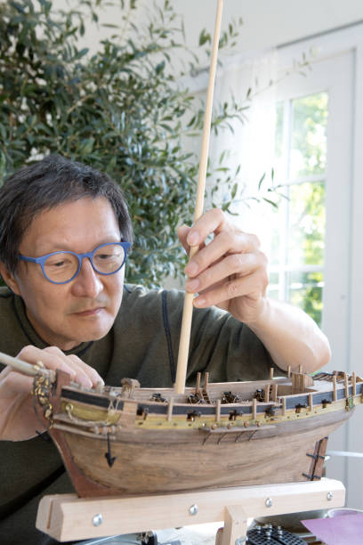 istock Retirement Hobby Leisure - Building Wooden Ship Kit Model 1304058512