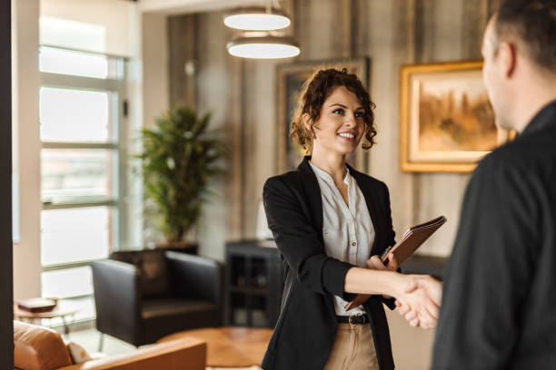 Working on project together, making deal. Business woman arranges business meeting with company. real estate agent stock pictures, royalty-free photos & images