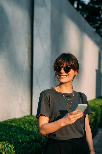 istock Women in Business: a Smiling Young Businesswoman on her Way to Work 1304064754
