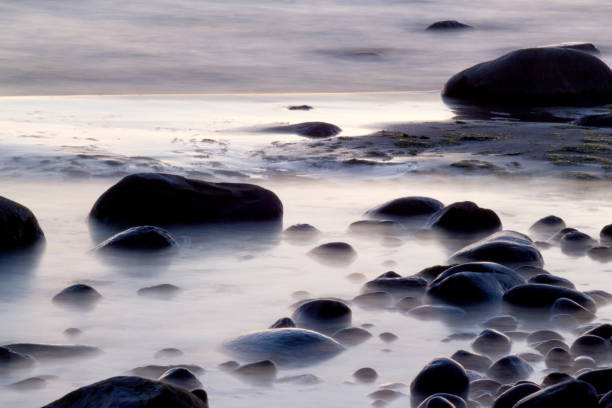 istock Stoned sea in purple colors 1304064828